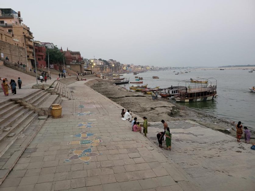 The ghat, muddy riverbank and old mansions along Ganges, Varanasi