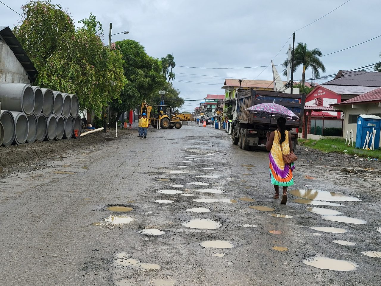 Streets under reconstruction, potholes filled with pus