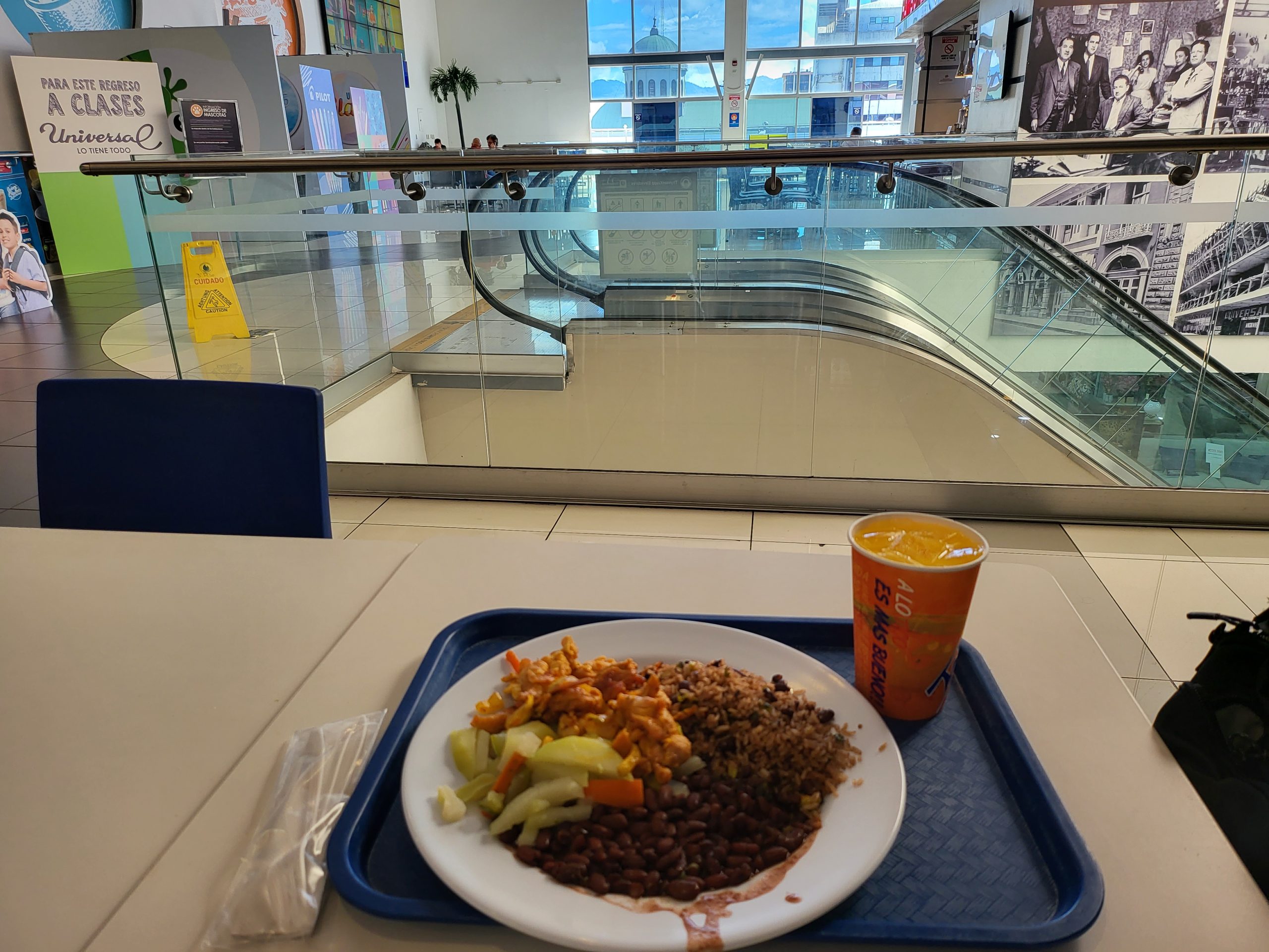 Lunch of rice, black bean, chicken and a side dish of more bean