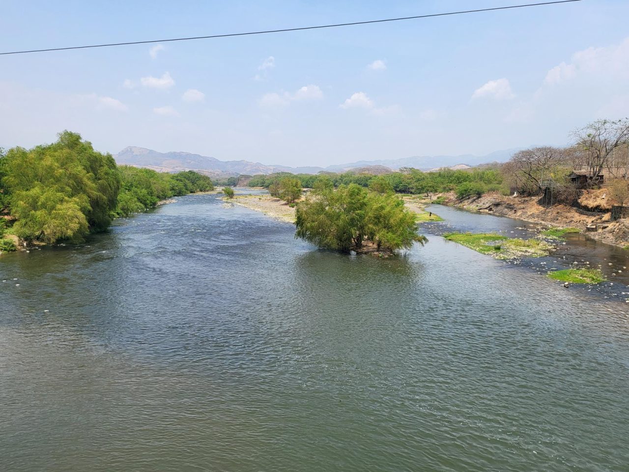 Crossing the border, the river dividing El Salvador and Guatemala