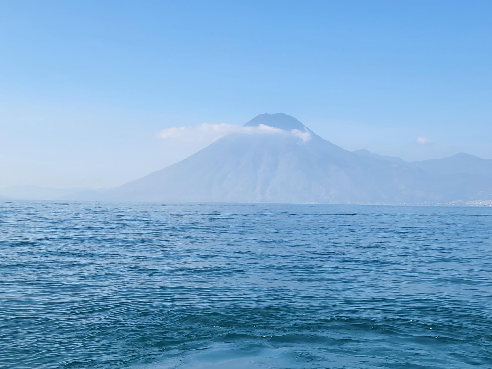 A beautiful and calm Lake Atitlan and its volcanoes - the product of a super eruption