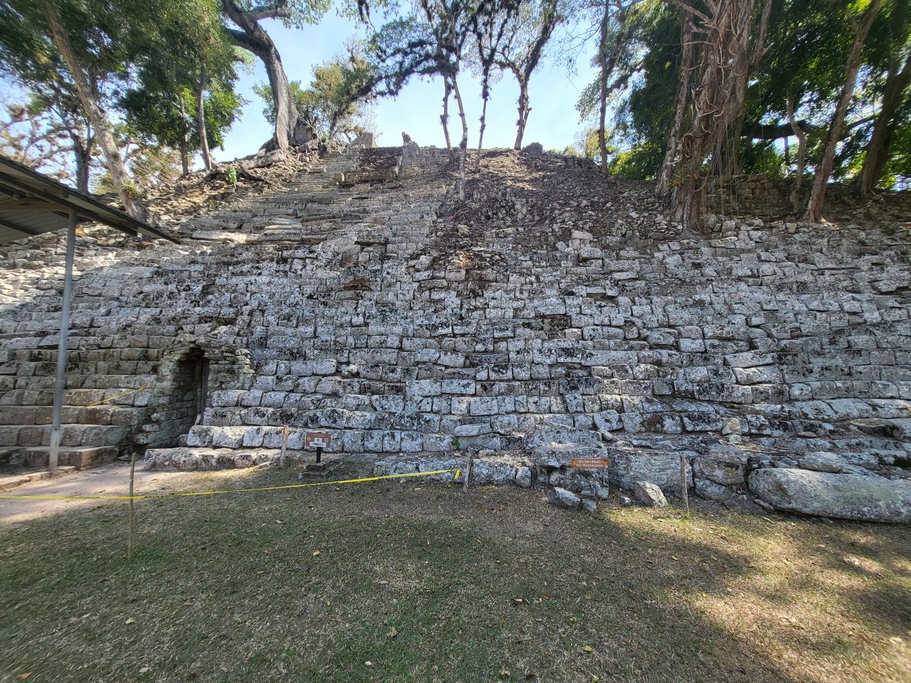 A ruined structure, high as a hill, in Copan Ruinas  