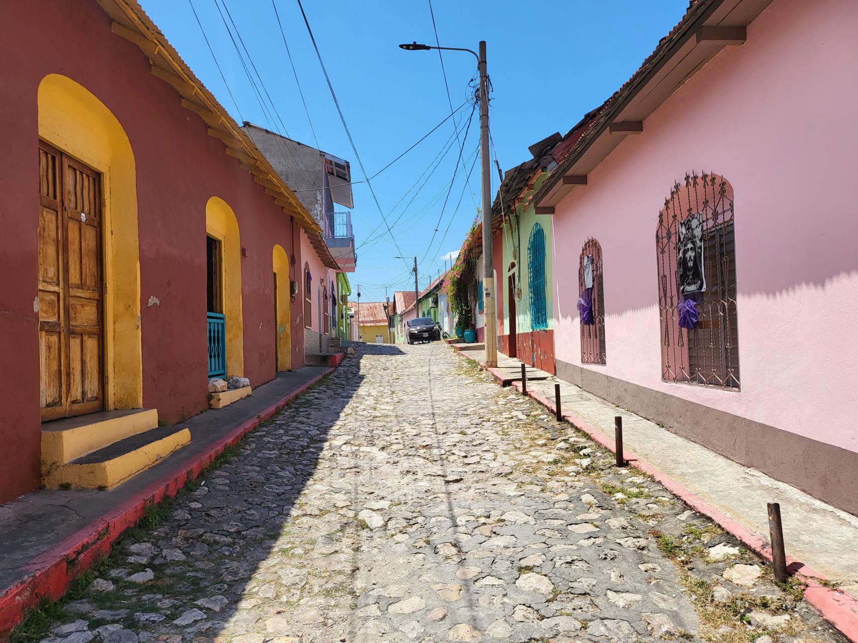 Vibrant houses on old cobblestone streets in Flores