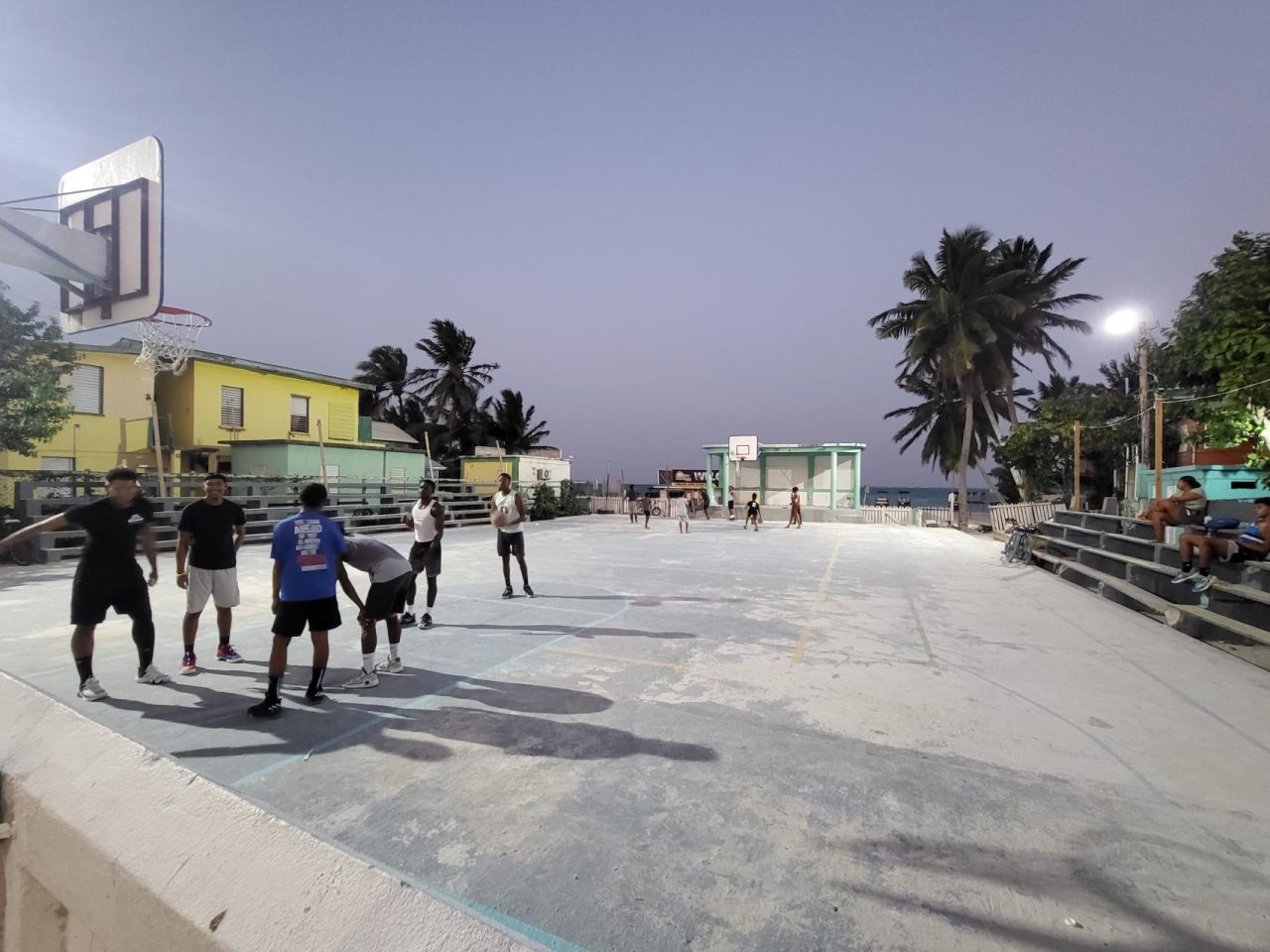 A basket ball court by the sea