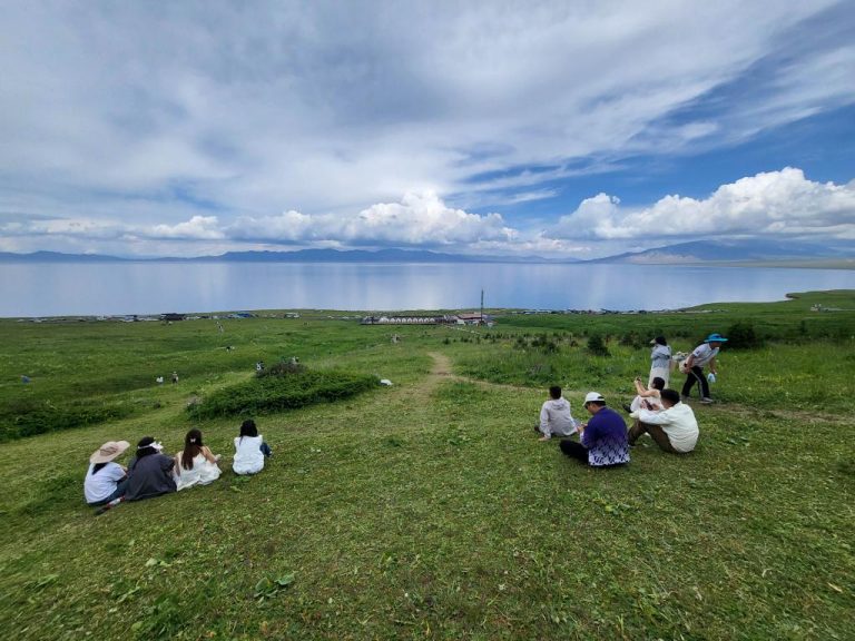 Viewed from high on the slopes, Sailimu is mirror-smooth