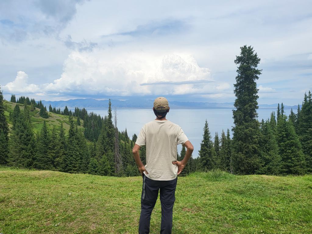 Mesmerized by the smooth Sailimu Lake from mountaintop