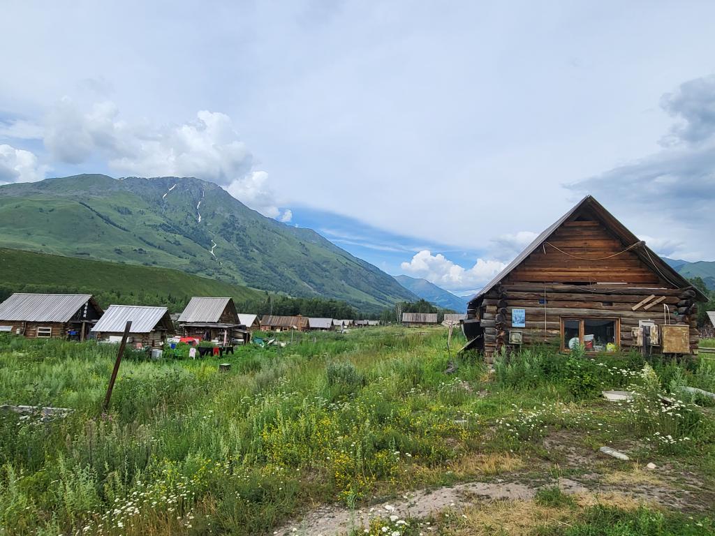 Log houses of the Kazakhs in Hemu Village, grass unmowed