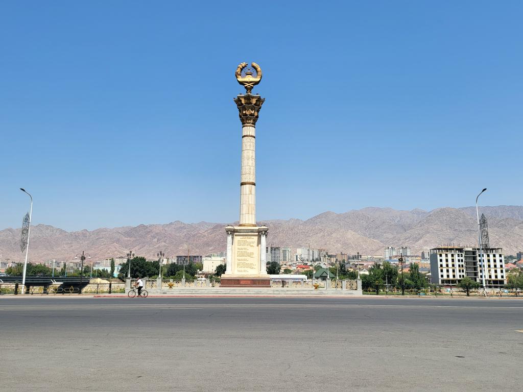 A monument rising against a background of bone-dry mountains