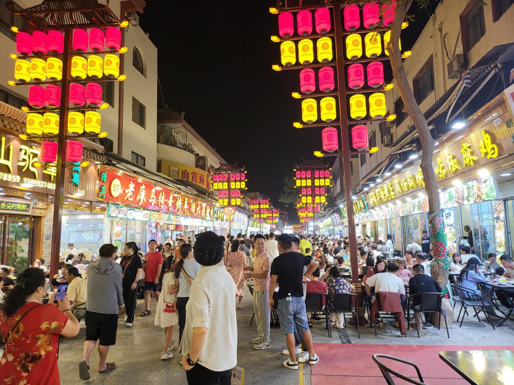 Buzzling open-air night food court in Dunhuang City center