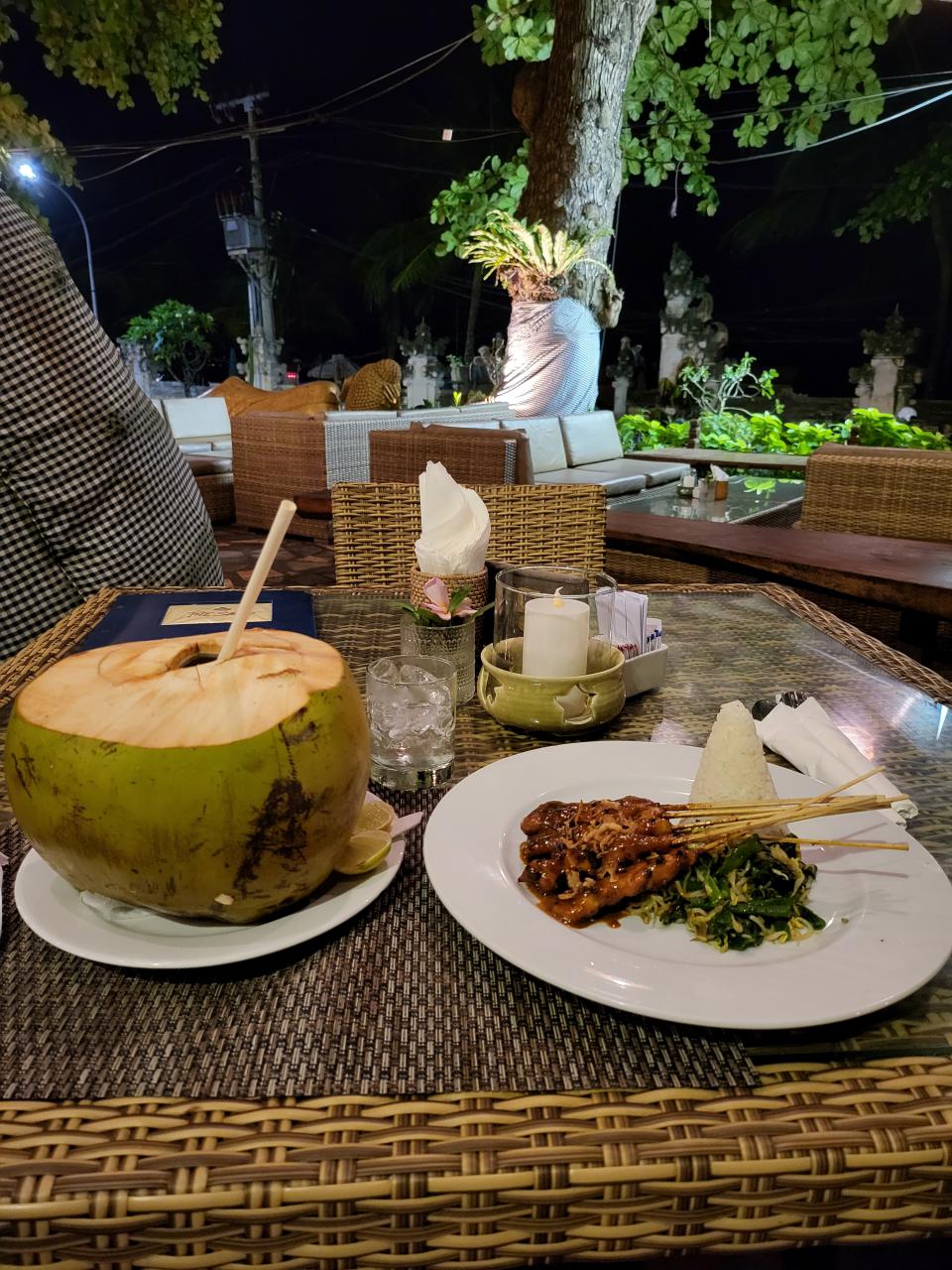 Satay and fresh coconut dinner on Seminyak Beach