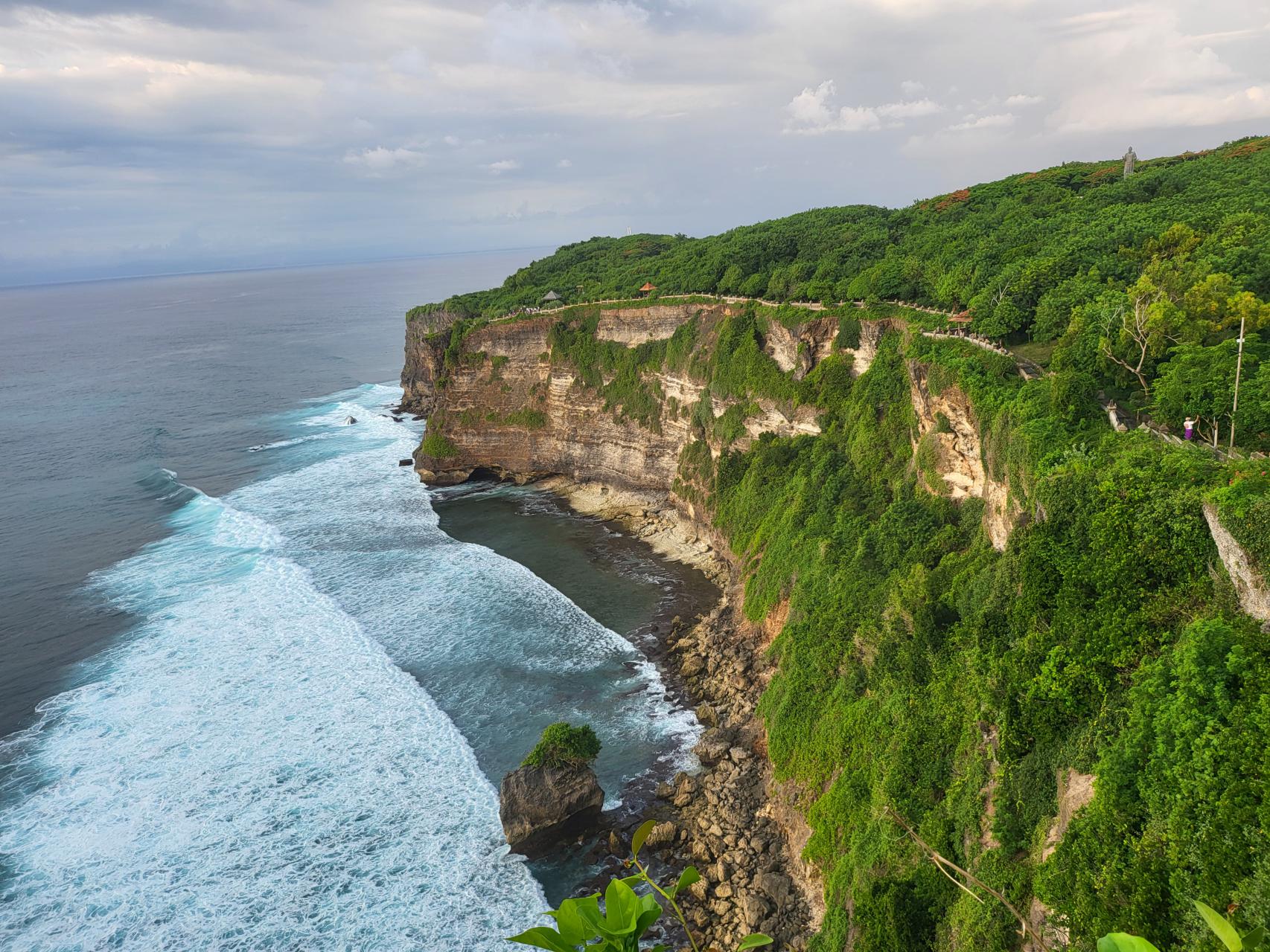 Uluwatu Temple, atop of a steep cliff with views of the Indian Ocean